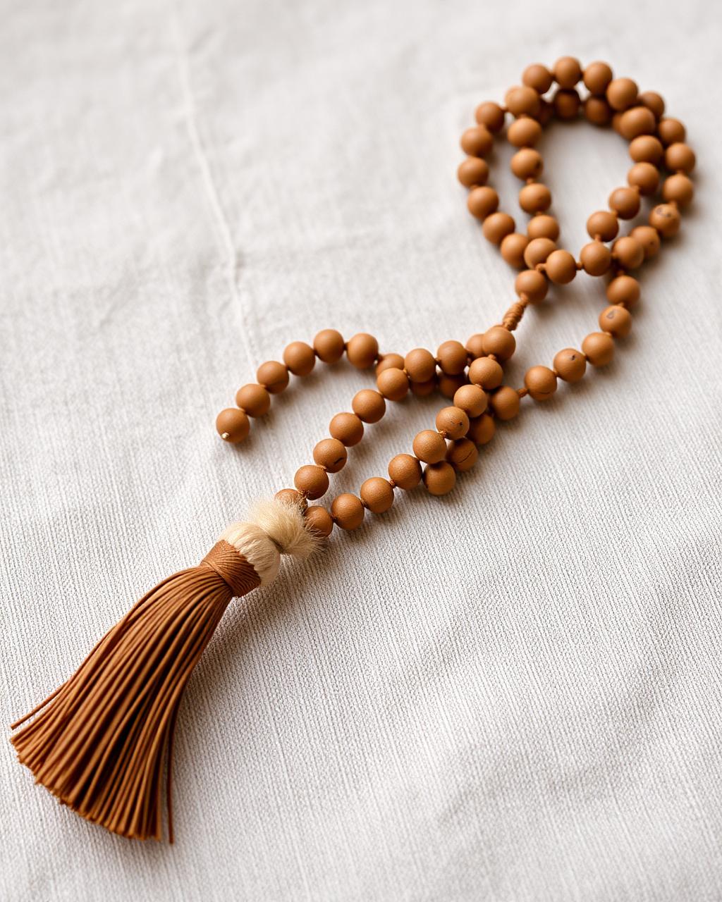 Bodhi seed mala with natural texture and hand-tied tassel